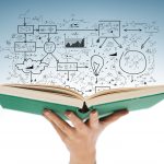 education and book concept - close up of female hand holding open green book with big plan